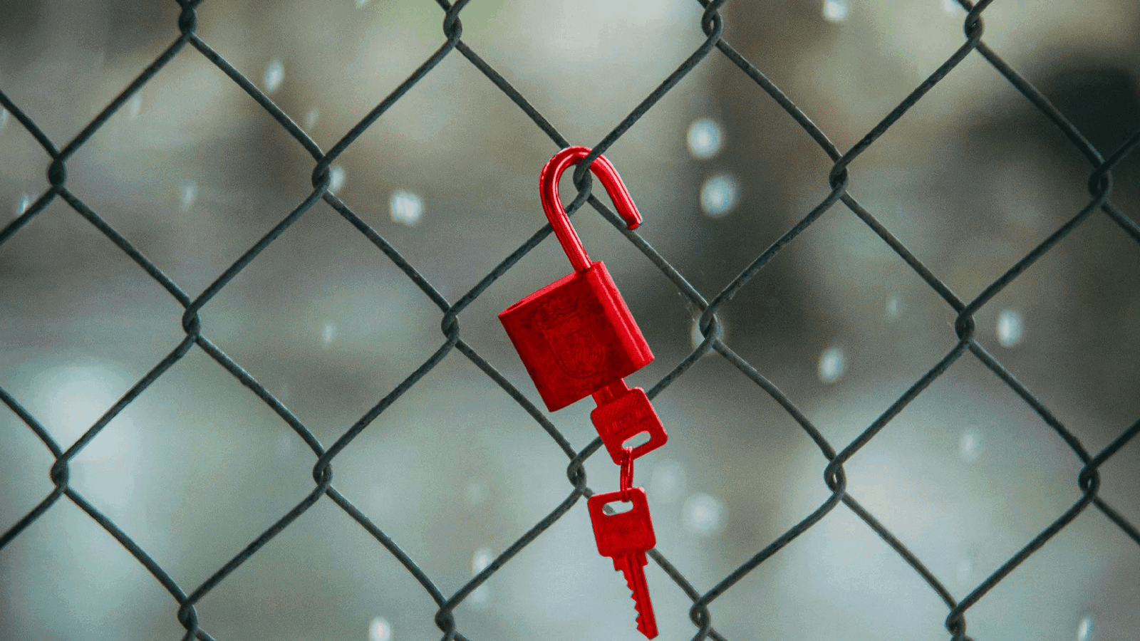 Token Theft - What is it and how is it Relevant to SMEs? header image - padlock open on fence